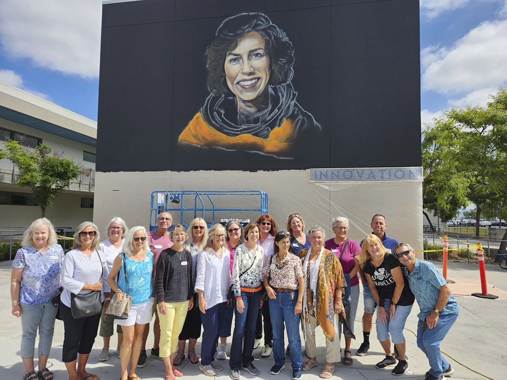 Ellen Ochoa surrounded by Class of 1975 mates
