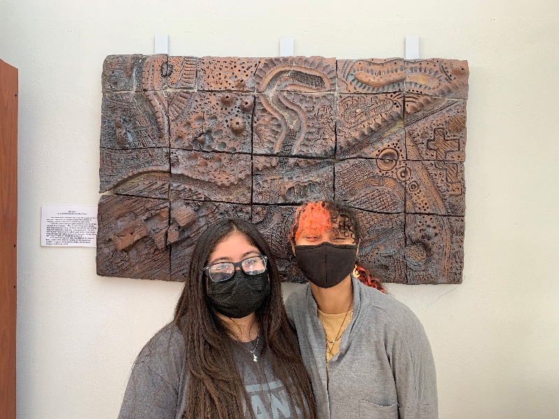 Iliana Rincon and Dawna Locher with 1979 Environmental Bas Relief Ceramic Project > April 2022 - GHS Museum Art (Part 2) - Grossmont High School Museum