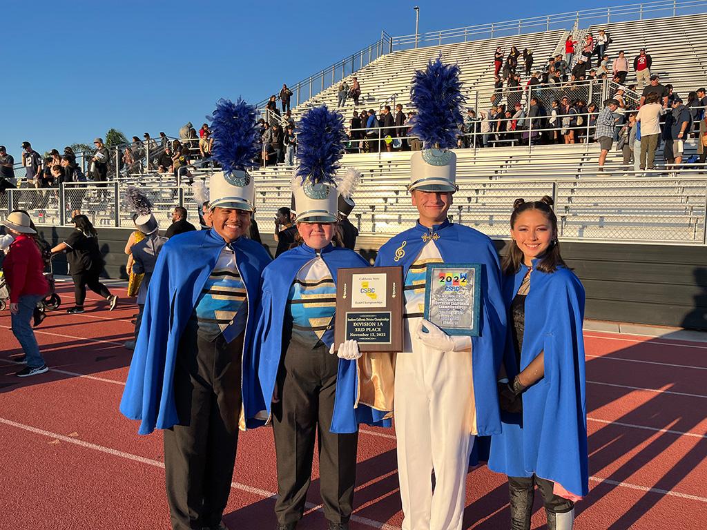 November 2022 California State Band Championships, Division 1A, with a 3rd place overall and received the High Music Award Drum Captain Anthony Rivera, Assistant Drum Captain Teigan DeVeny, Drum Major Enrique Wilcox and Guard Captain Anna Dossenberry > December 2022 - Performing Arts Department - Grossmont High School Museum