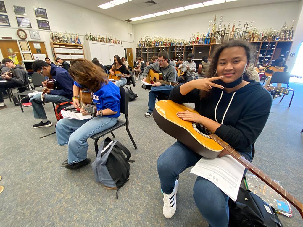 November 2022 Kiyara Abernathy Enjoys Her Guitar Class > December 2022 - Performing Arts Department - Grossmont High School Museum