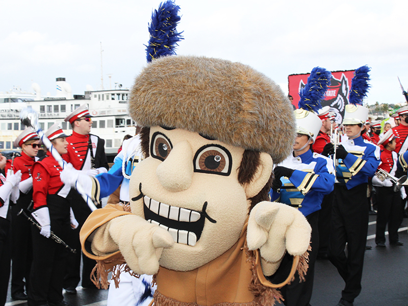 Gus at Holiday Bowl Parade > February 2022 - Marching Band on Parade - Grossmont High School Museum